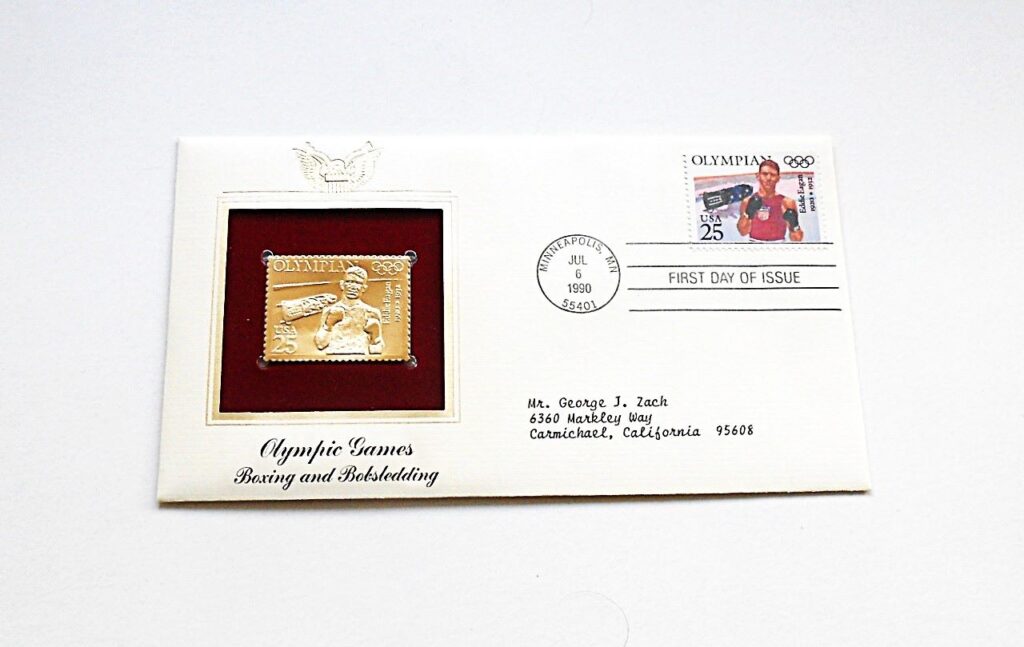 Olympic Games boxing and bobshedding gold USA stamp