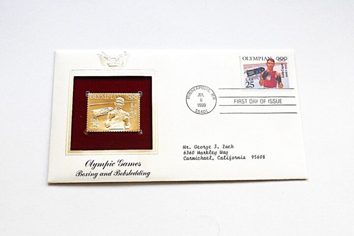 Olympic Games boxing and bobshedding gold USA stamp